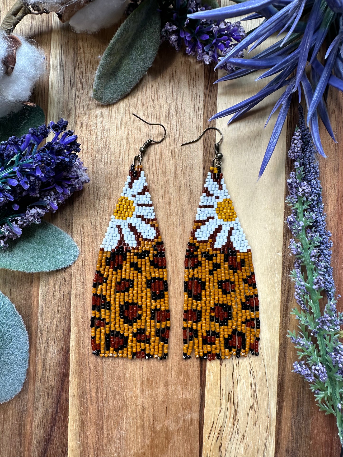 White Flower Cheetah Print beaded fringe earrings