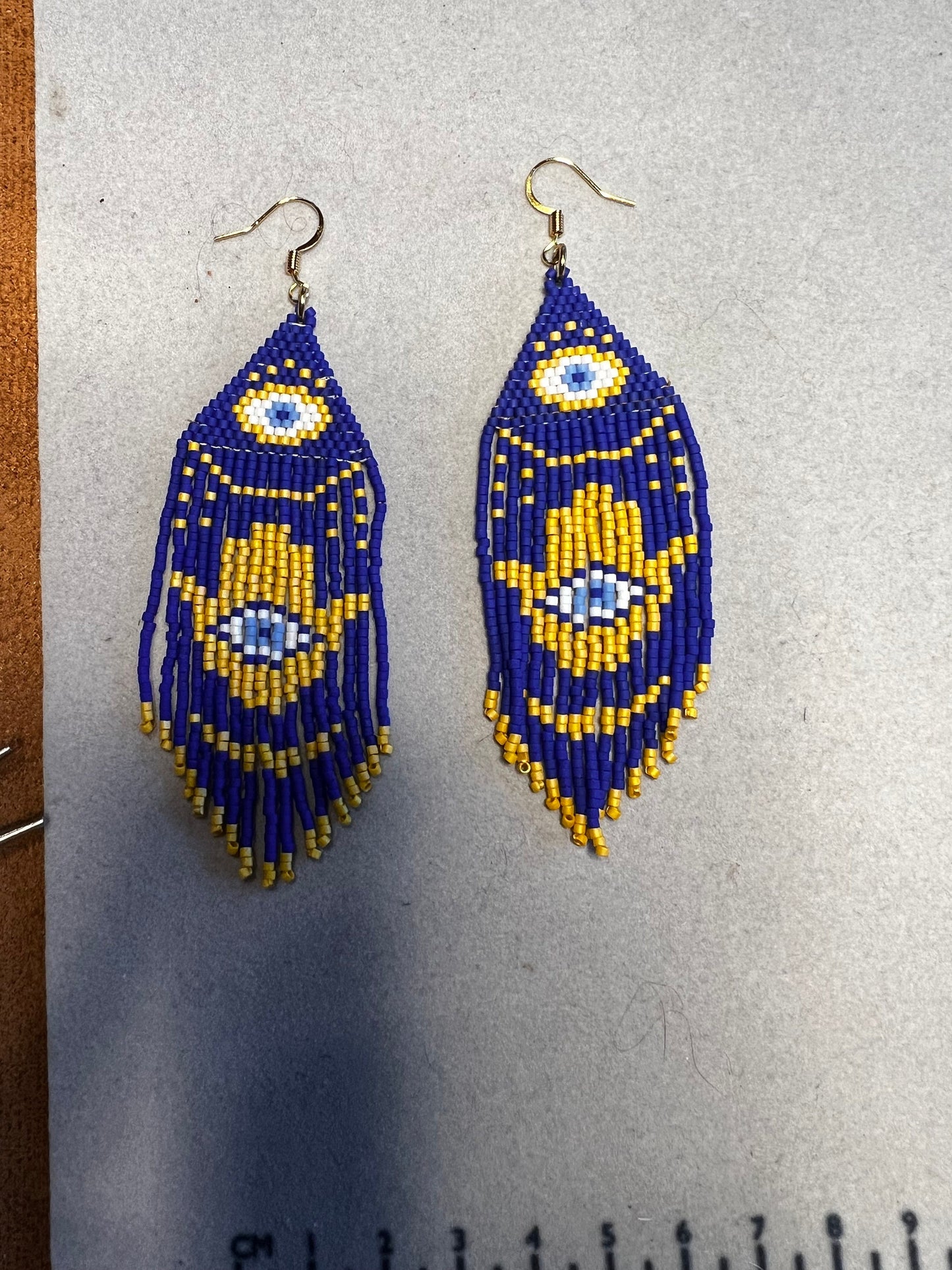 Dark blue evil eye, hand of Fatima with gold accent seed bead brickstitch dangle drop earrings