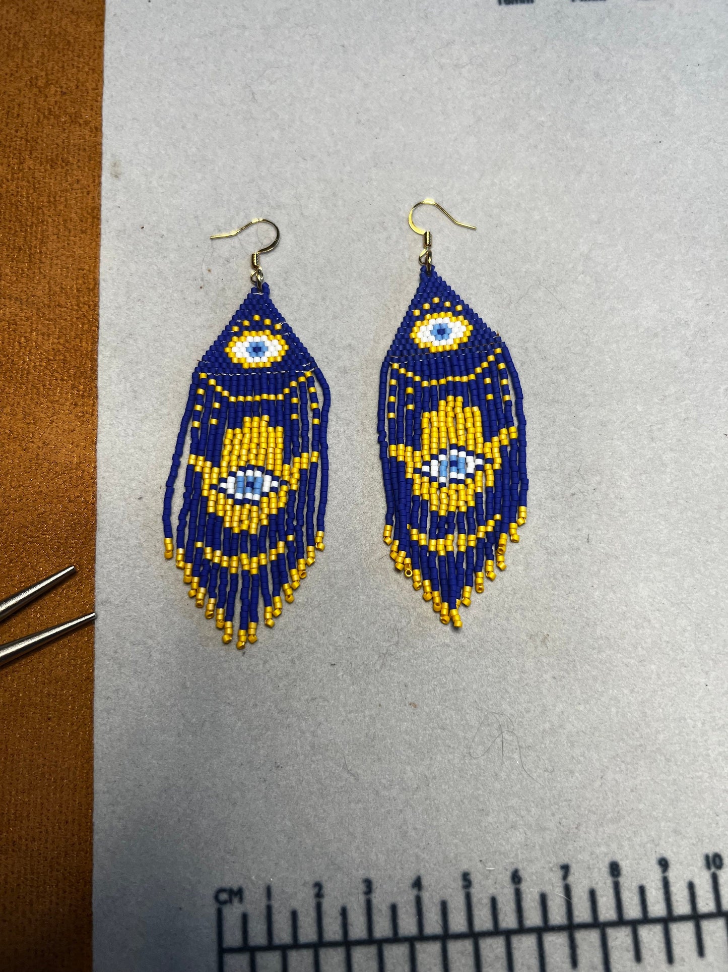 Dark blue evil eye, hand of Fatima with gold accent seed bead brickstitch dangle drop earrings